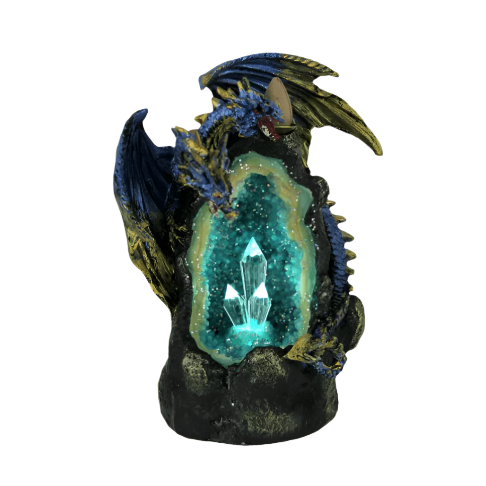 Two headed blue and gold dragons on large open geode with blue crystals and lit up LED crystals