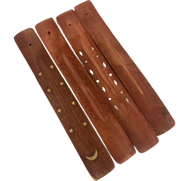 4 Assorted incense burners with different patterns and a plain one