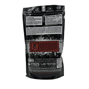 Black supplement package with red label on a gray background